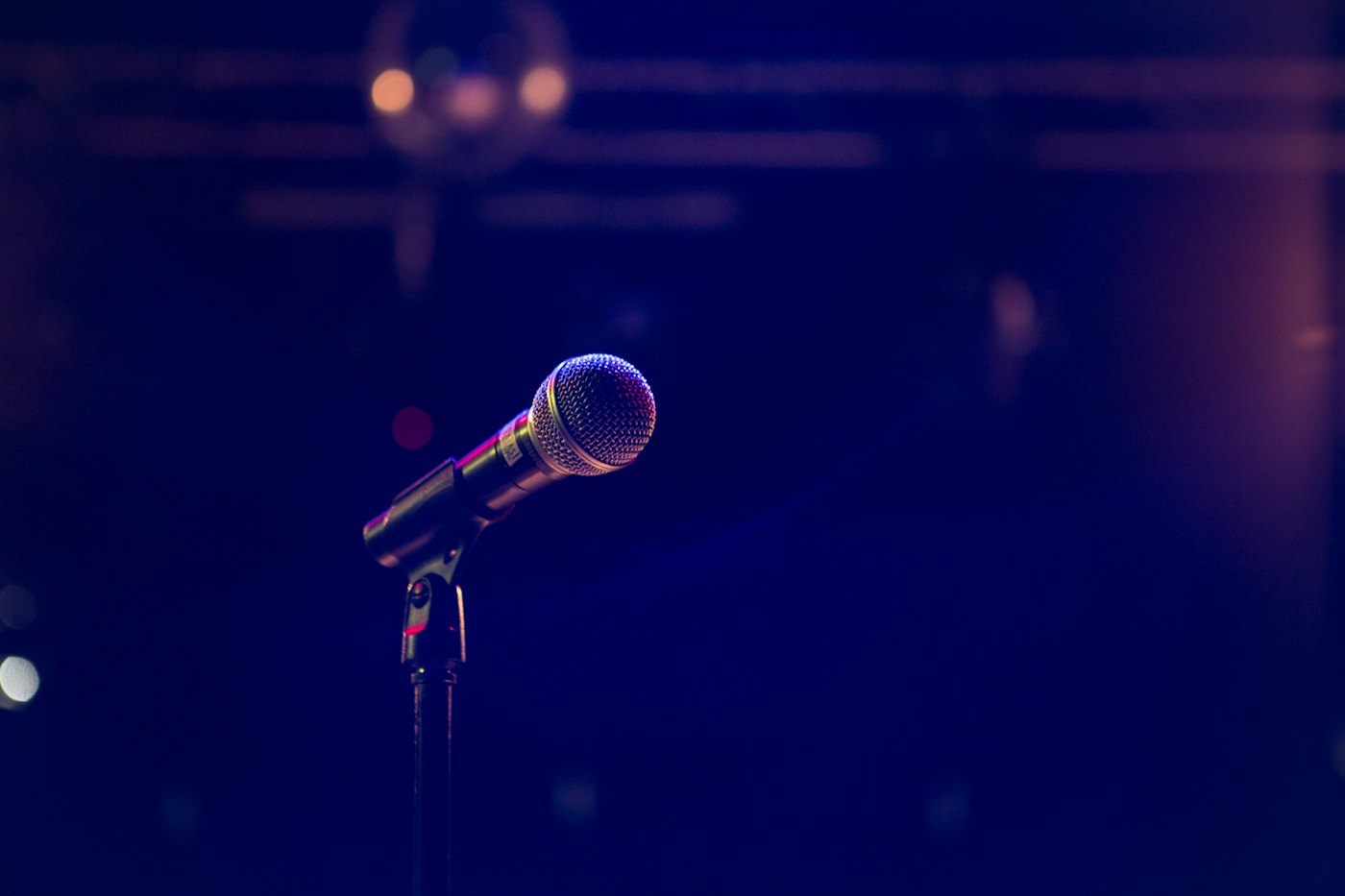 A microphone on a stand, ready for open mic